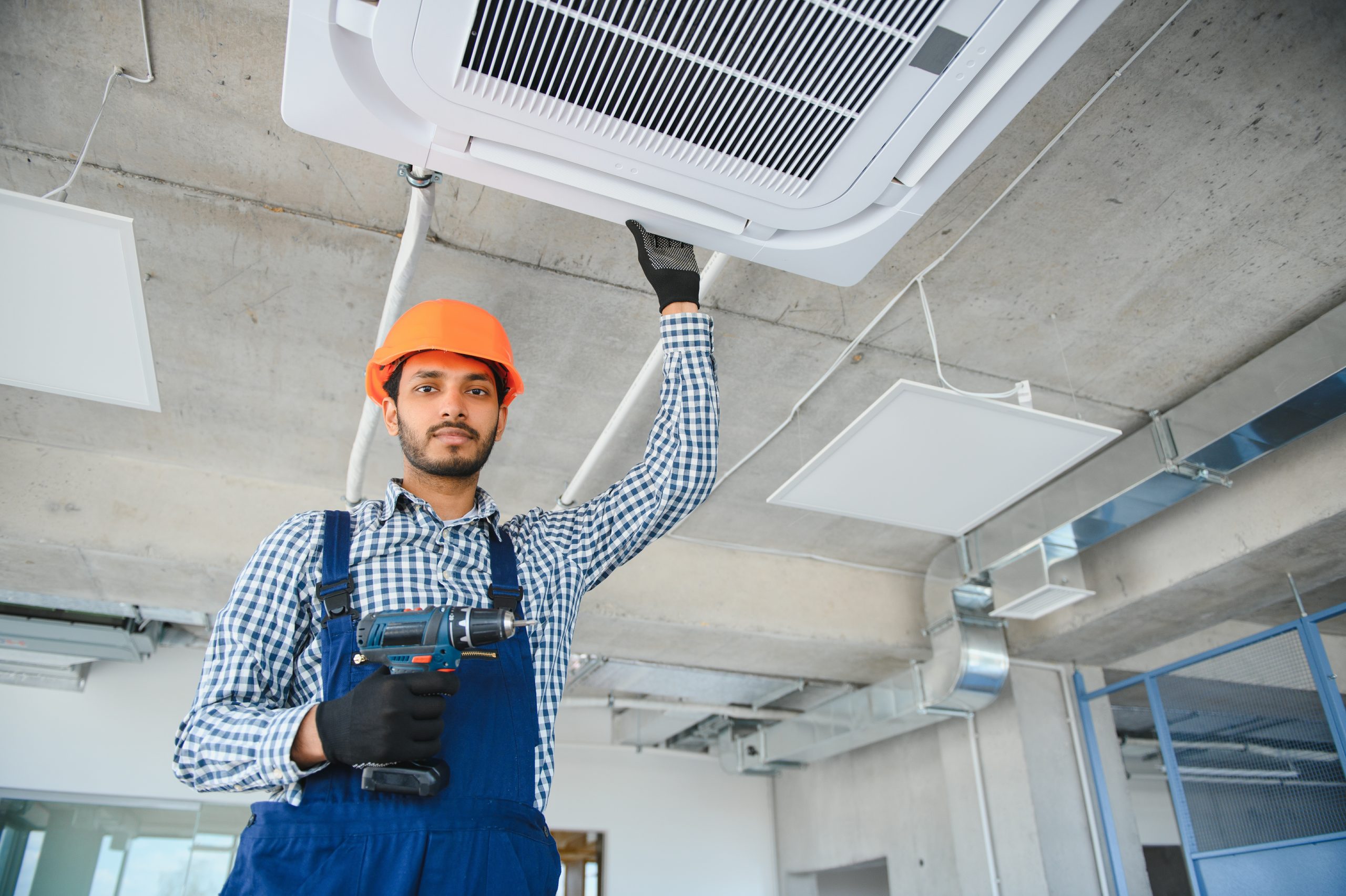 professional technician maintaining modern air con 2025 03 15 23 57 22 utc 1 scaled